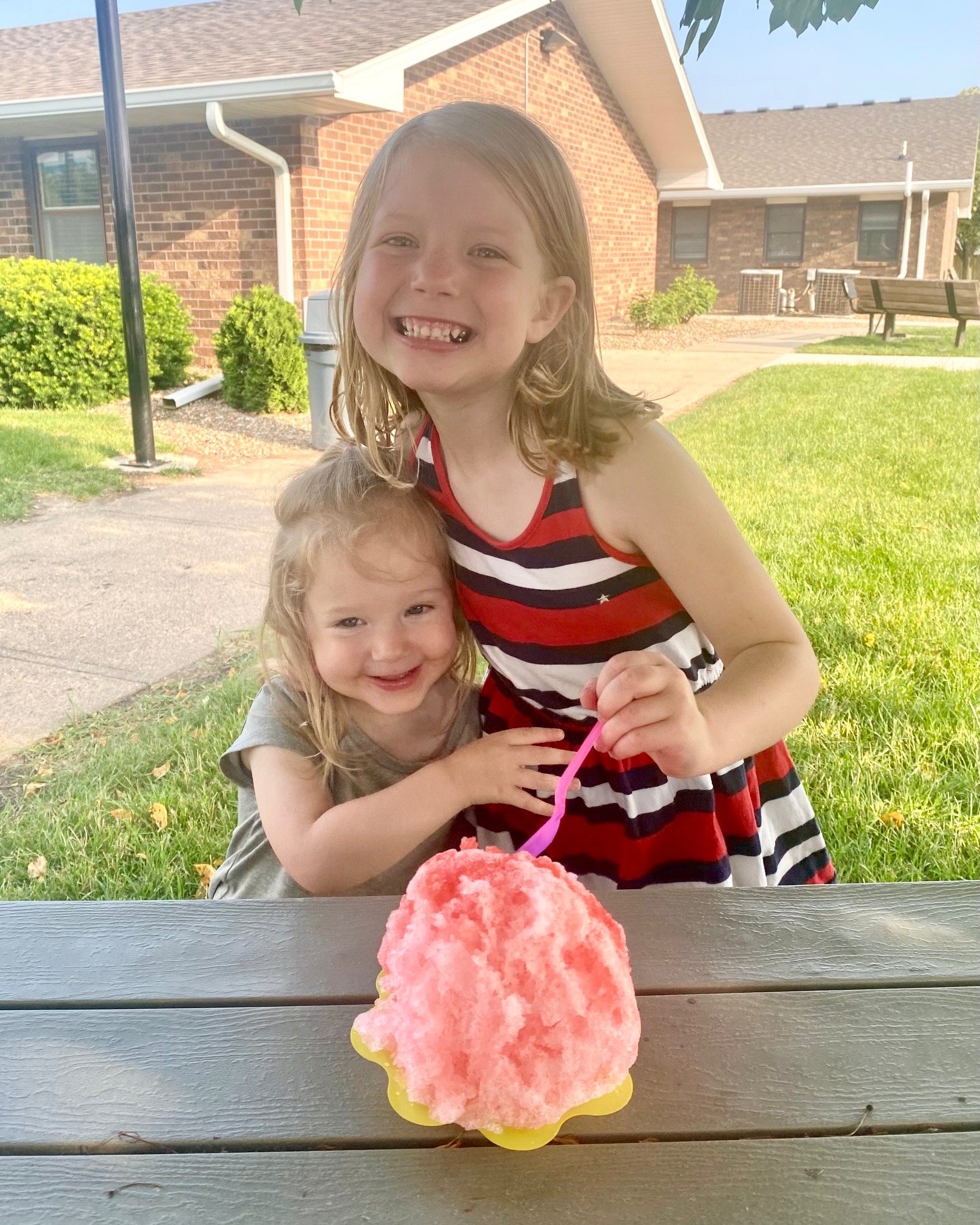 Two sisters with shaved ice